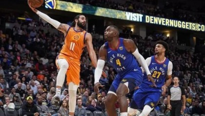  太阳加时险胜掘金登顶西部  